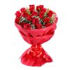 red roses with green leaves wrapped in red paper and tied with red ribbon