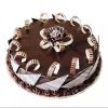 Round shaped chocolate cake decorated with chocolate sticks
