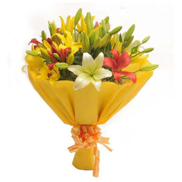 Colorful asiatic lilies wrapped in yellow paper and tied with yellow ribbon